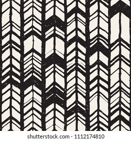 Seamless hand drawn style chevron pattern in black and white. Abstract vector grungy background