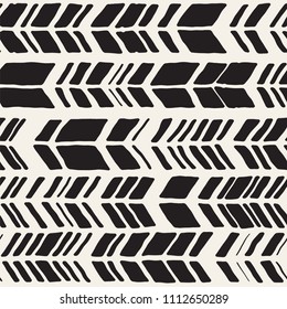 Seamless hand drawn style chevron pattern in black and white. Abstract vector grungy background