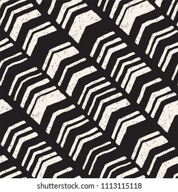 Seamless hand drawn style chevron pattern in black and white. Abstract vector grungy background