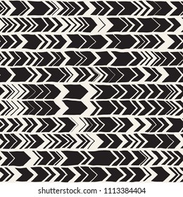 Seamless hand drawn style chevron pattern in black and white. Abstract vector grungy background