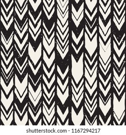 Seamless hand drawn style chevron pattern in black and white. Abstract vector grungy background