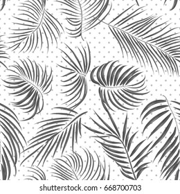 Seamless hand drawn tropical pattern with areca leaves, jungle exotic leaf in black and white color on polka dot background. Fashion textile print, summer floral wallpaper. Vector illustration