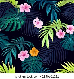Seamless hand drawn tropical vector pattern with bright hibiscus flowers and exotic palm leaves on dark background.