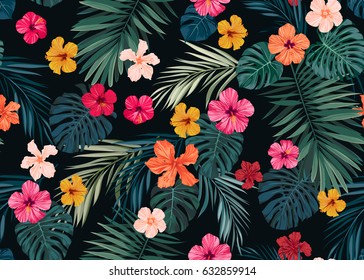 Seamless hand drawn tropical vector pattern with bright hibiscus flowers and exotic palm leaves on dark background.