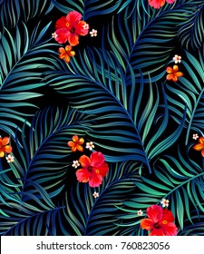	
Seamless hand drawn tropical vector pattern with bright hibiscus flowers and exotic palm leaves on dark background.
