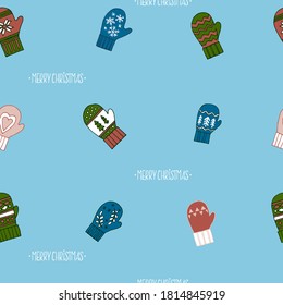 Seamless hand drawn vector christmas  pattern. Colorful mitten illustartion background for packaging, wrapping, wallpaper on blue