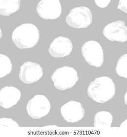 Seamless hand drawn vector snowball dots pattern.