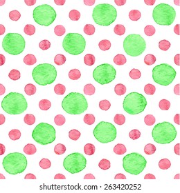Seamless hand drawn watercolor pattern made of round green and red dots, isolated over white.