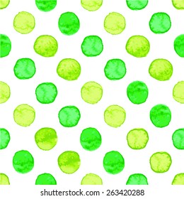 Seamless hand drawn watercolor pattern made of round green dots, isolated over white.