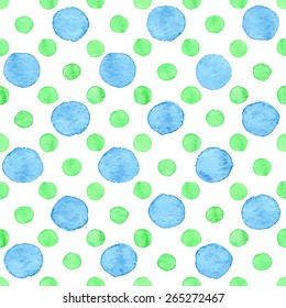 Seamless hand drawn watercolor pattern made of round blue and green dots, isolated over white.