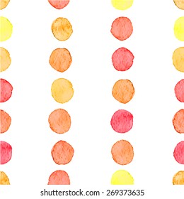 Seamless hand drawn watercolor pattern made of round red and orange dots, isolated over white.