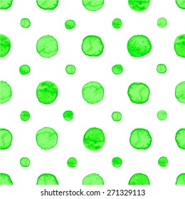 Seamless hand drawn watercolor pattern made of round green dots, isolated over white.