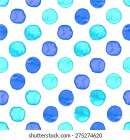 Seamless hand drawn watercolor pattern made of round light and dark blue dots, isolated over white.