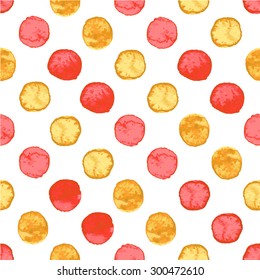 Seamless hand drawn watercolor pattern made of round red and orange dots, isolated over white.