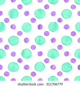 Seamless hand drawn watercolor pattern made of round green and purple dots, isolated over white.