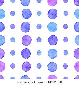 Seamless hand drawn watercolor pattern made of round blue and purple dots, isolated over white.