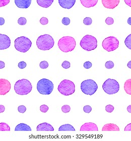 Seamless hand drawn watercolor pattern made of round pink and purple dots, isolated over white.