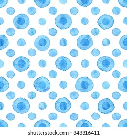 Seamless hand drawn watercolor pattern made of round blue dots, isolated over white.