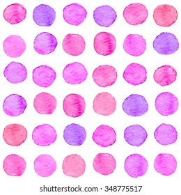 Seamless hand drawn watercolor pattern made of round pink and purple dots, isolated over white.