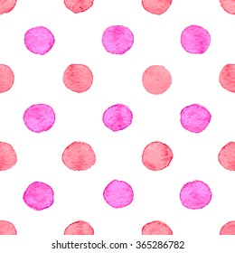Seamless hand drawn watercolor pattern made of round red and pink dots, isolated over white.