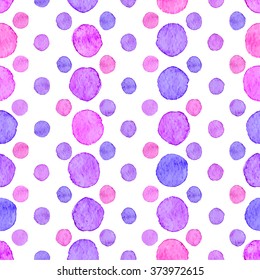 Seamless hand drawn watercolor pattern made of round pink and purple dots, isolated over white.