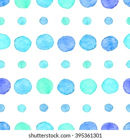 Seamless hand drawn watercolor pattern made of round blue dots, isolated over white.