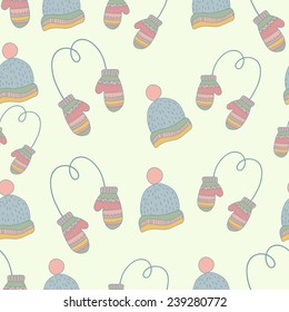 Seamless hand drawn winter clothes pattern. Set  mittens, hat, ice skates. Pastel color