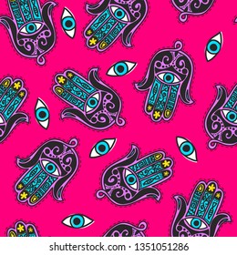 Seamless hand of fatima and eyes background pattern in vector