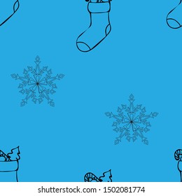 Seamless hand-drawn pattern. New Year theme, boots and snowflake ns against blue background. Holiday design.