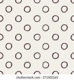 Seamless hand-drawn polka dot pattern. Doodle illustration.