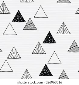 Seamless hand-drawn triangles pattern.Vector abstract Hand drawn background for design and decoration textile, covers, package, wrapping paper.