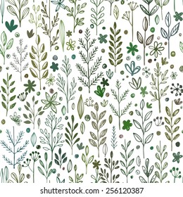 Seamless hands drawn spring pattern with grass and flowers. Vector illustration EPS10