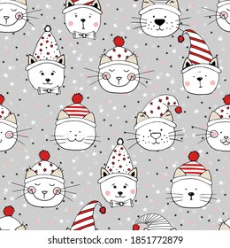 Seamless head nice kittens with hats on stars background. Pattern for Merry Christmas. Print for fabric, wrapping paper and children's accessories.
