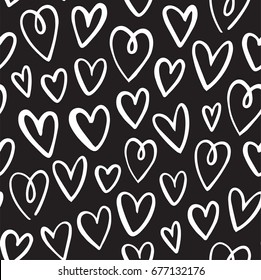 Seamless heart pattern in doodle style. Hand drawn abstract vector background. Black and white.