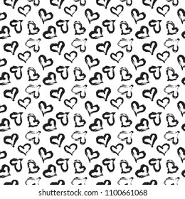 Seamless heart pattern hand painted with ink brush. Vintage style tileable vector illustration
