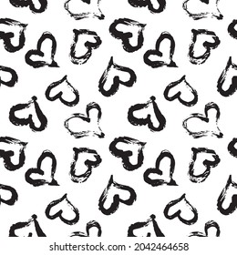 Seamless heart pattern hand painted with ink brush. Vintage style tileable vector illustration