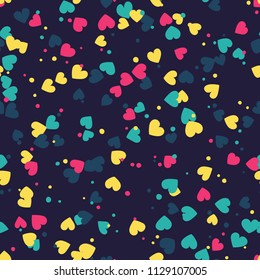 Seamless hearts and dots pattern. Vector repeating texture.