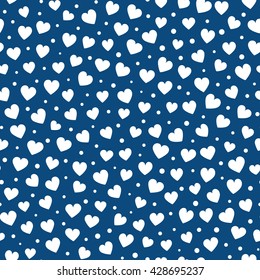 Seamless hearts and dots pattern. Vector repeating texture.