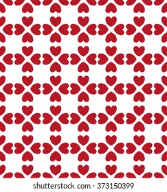 Seamless hearts pattern in red over white  . Valentine's day tile background. Romantic vector pattern.