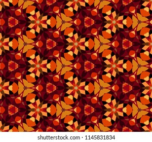 Seamless hexagonal bright pattern from geometrical abstract ornaments multicolored in red and orange shades on a dark background. Vector illustration. Suitable for fabric, wallpaper or wrapping paper.