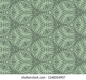 Seamless hexagonal pattern from geometrical abstract ornaments on a teal background. Vector illustration. Suitable for fabric, wallpaper, wrapping paper