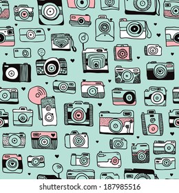 Seamless hipster toy camera illustration background pattern in vector