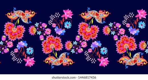Seamless horizontal border with paisley and bright fantasy flowers on dark blue background. Vintage style. Indian, mexican motifs.