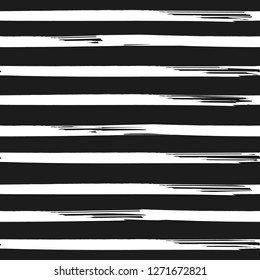 Seamless horizontal texture with black brush strokes. Geometrical marker lines background. Monochrome stripes grunge patterns. Fashion backdrop. Vector.