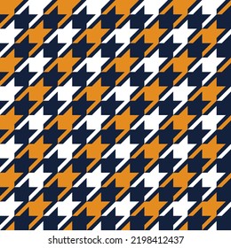 Seamless houndstooth pattern background with yellow black white and brown. Vintage houndstooth texture for textile and fashion industry. Classic pattern for fashion print.