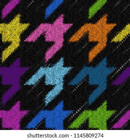 Seamless Hounds-tooth pattern. Imitation of a texture of rough canvas. Vector image.