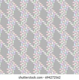 Seamless houndstooth pattern in soft colors for textile. Shimmering background in blue and pink tints. Vector background of geometric shapes. Background in soft tones.  