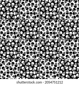 Seamless human skull background. Silhouettes of white skulls on a black background and black skulls on a white background, arranged in a checkerboard pattern. Vector illustration for design and web.