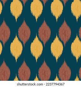 Seamless Ikat ethnic pattern. Abstract textured background in tribal,folk embroidery, Aztec chevron art and Mexican style.fabric carpet ornament native textile wallpaper wrapping design.
