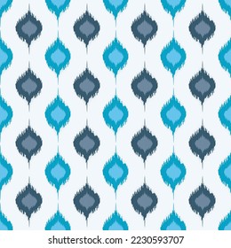 Seamless Ikat ethnic pattern on blue tone. Abstract textured background. Fabric carpet ornament native textile wallpaper vector illustration design.
